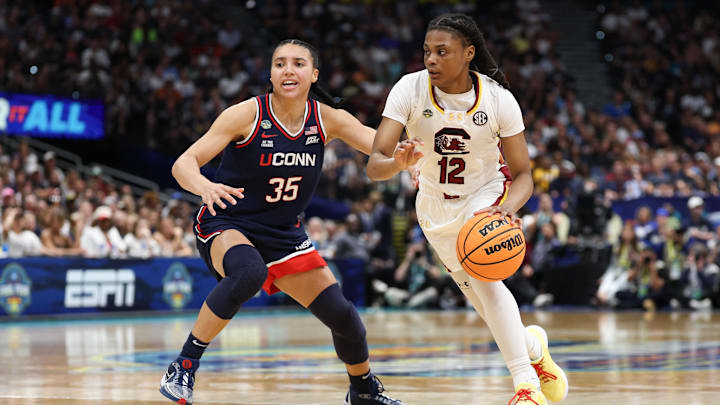 Apr 6, 2025; Tampa, FL, USA; Connecticut Huskies guard Azzi Fudd (35) defends against South Carolina Gamecocks guard MiLaysia Fulwiley (12) during the second half of the national championship of the women's 2025 NCAA tournament at Amalie Arena. Mandatory Credit: Nathan Ray Seebeck-Imagn Images