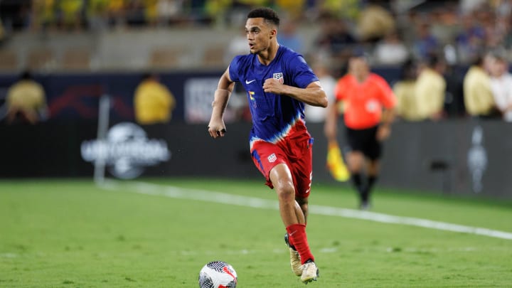 Jun 12, 2024; Orlando, Florida, USA;  United States defender Antonee Robinson (5) controls the ball against Brazil in the second half during the Continental Clasico at Camping World Stadium. Mandatory Credit: Nathan Ray Seebeck-USA TODAY Sports