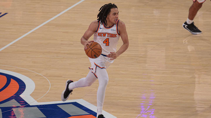 Oct 13, 2025; New York, New York, USA; New York Knicks forward Pacome Dadiet (4) dribbles up court against the Washington Wizards during the first quarter at Madison Square Garden. Mandatory Credit: Vincent Carchietta-Imagn Images