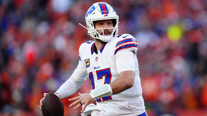 Jan 17, 2026; Denver, CO, USA; Buffalo Bills quarterback Josh Allen (17) rolls out during the second quarter of an AFC Divisional Round playoff game against the Denver Broncos at Empower Field at Mile High.