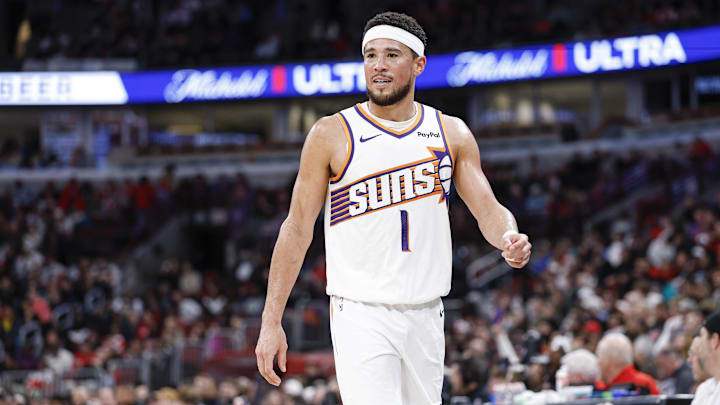 Apr 5, 2026; Chicago, Illinois, USA; Phoenix Suns guard Devin Booker (1) walks on the court during the second half at United Center. Mandatory Credit: Kamil Krzaczynski-Imagn Images