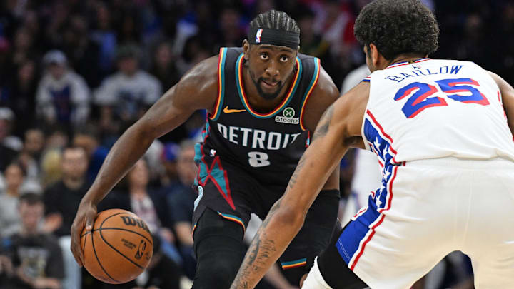 Apr 4, 2026; Philadelphia, Pennsylvania, USA; Detroit Pistons guard Caris LeVert (8) is defended by Philadelphia 76ers forward Dominick Barlow (25) during the first half at Xfinity Mobile Arena. Mandatory Credit: Eric Hartline-Imagn Images