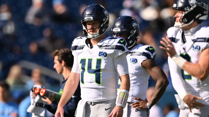 Nov 23, 2025; Nashville, Tennessee, USA;  Seattle Seahawks quarterback Sam Darnold (14) warms up before a game against the Tennessee Titans at Nissan Stadium. Mandatory Credit: Steve Roberts-Imagn Images