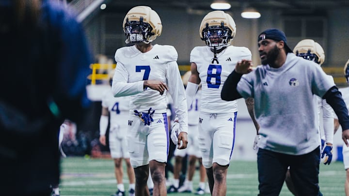 Ephesians Prysock (7) and Tacario Davis (8) are usually together at practice and in games. 