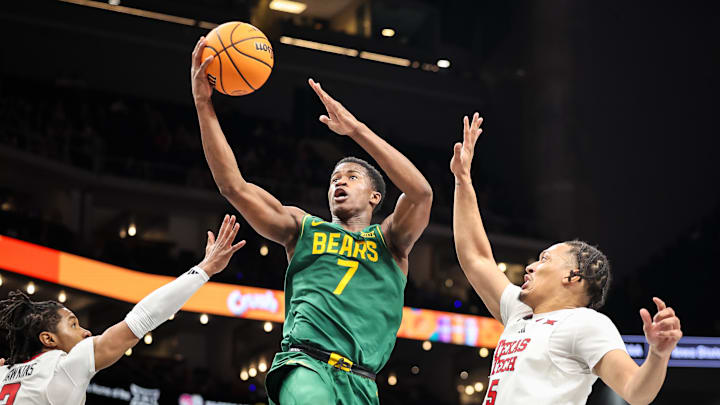 Mar 13, 2025; Kansas City, MO, USA; Baylor Bears guard VJ Edgecombe (7) shoots the ball during the second half against the Texas Tech Red Raiders at T-Mobile Center. Mandatory Credit: William Purnell-Imagn Images
