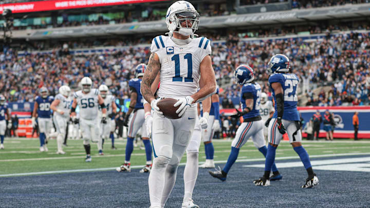 Dec 29, 2024; East Rutherford, New Jersey, USA; Indianapolis Colts wide receiver Michael Pittman Jr. (11) celebrates his touchdown during the second half against the New York Giants at MetLife Stadium. Mandatory Credit: Vincent Carchietta-Imagn Images Dec 29, 2024; East Rutherford, New Jersey, USA; Indianapolis Colts wide receiver Michael Pittman Jr. (11) celebrates his touchdown during the second half against the New York Giants at MetLife Stadium. Mandatory Credit: Vincent Carchietta-Imagn Images