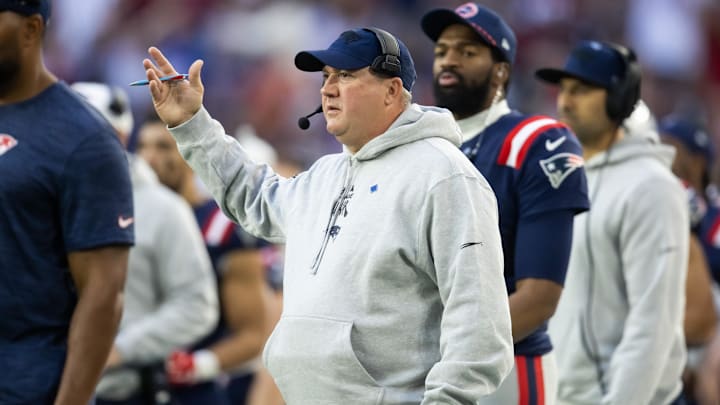 Dec 15, 2024; Glendale, Arizona, USA; New England Patriots offensive coordinator Alex Van Pelt against the Arizona Cardinals at State Farm Stadium. Mandatory Credit: Mark J. Rebilas-Imagn Images