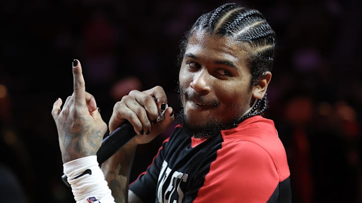 Apr 13, 2025; Houston, Texas, USA;  Houston Rockets guard Jalen Green (4) talks to the fans before playing against the Denver Nuggets at Toyota Center. Mandatory Credit: Thomas Shea-Imagn Images