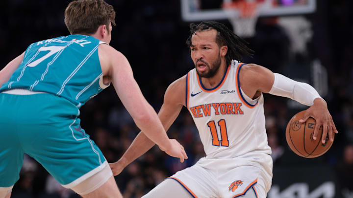 Oct 17, 2025; New York, New York, USA; New York Knicks guard Jalen Brunson (11) dribbles against Charlotte Hornets guard/forward Kon Knueppel (7) during the second half at Madison Square Garden. Mandatory Credit: Vincent Carchietta-Imagn Images