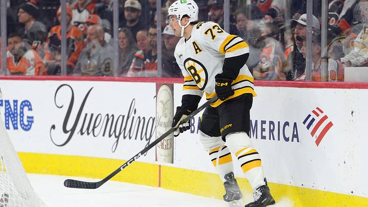 Apr 5, 2026; Philadelphia, Pennsylvania, USA; Boston Bruins defenseman Charlie McAvoy (73) controls the puck against the Philadelphia Flyers in the first period at Xfinity Mobile Arena. Mandatory Credit: Kyle Ross-Imagn Images
