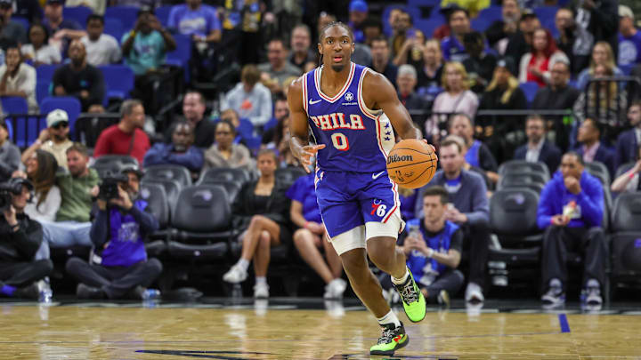 Oct 18, 2024; Orlando, Florida, USA; Philadelphia 76ers guard Tyrese Maxey (0) brings the ball up court during the first quarter against the Orlando Magic at Kia Center. Mandatory Credit: Mike Watters-Imagn Images