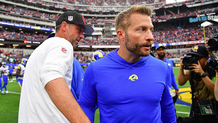 Sep 17, 2023; Inglewood, California, USA; San Francisco 49ers head coach Kyle Shanahan meets with Los Angeles Rams head coach Sean McVay following the victory at SoFi Stadium. Mandatory Credit: Gary A. Vasquez-Imagn Images