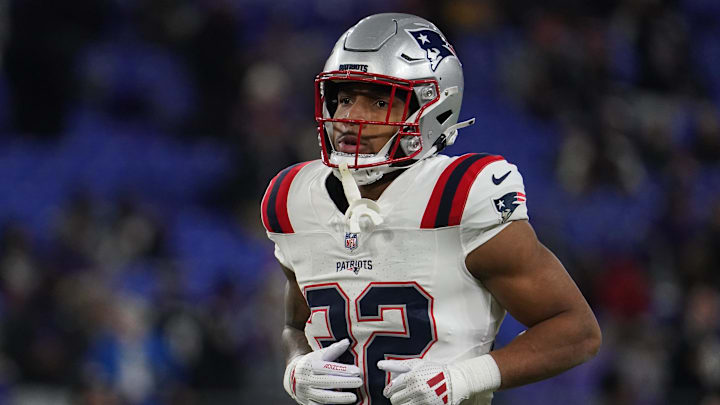 Dec 21, 2025; Baltimore, Maryland, USA;  New England Patriots running back Treveyon Henderson (32) warms up prior to the game against the Baltimore Ravens at M&T Bank Stadium. Mandatory Credit: James Lang-Imagn Images