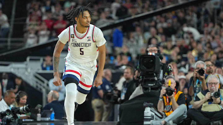 Apr 8, 2024; Glendale, AZ, USA; Connecticut Huskies guard Stephon Castle (5) reacts after shooting