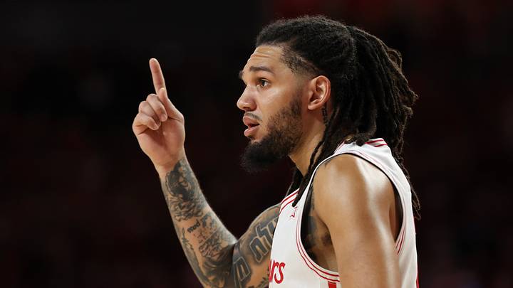 Feb 21, 2026; Houston, Texas, USA; Houston Cougars guard Emanuel Sharp (21) reacts while playing against the Arizona Wildcats in the first half at Fertitta Center. Feb 21, 2026; Houston, Texas, USA; Houston Cougars guard Emanuel Sharp (21) reacts while playing against the Arizona Wildcats in the first half at Fertitta Center.