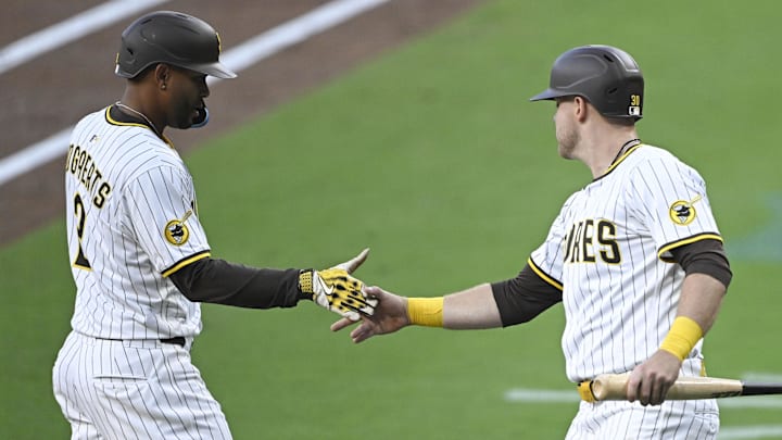 Apr 29, 2025; San Diego, California, USA; San Diego Padres shortstop Xander Bogaerts (2) is congratulated by  Gavin Sheets (30) after scoring during the first inning against the San Francisco Giants at Petco Park. Mandatory Credit: Denis Poroy-Imagn Images