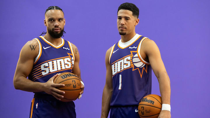 Sep 24, 2025; Phoenix, AZ, USA; Phoenix Suns forward Dillon Brooks (3) and guard Devin Booker (1) pose for portrait during Media Day at PHX Arena. Mandatory Credit: Mark J. Rebilas-Imagn Images