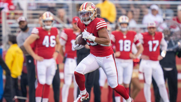 September 21, 2023; Santa Clara, California, USA; San Francisco 49ers running back Elijah Mitchell (25) runs the football against the New York Giants during the second quarter at Levi's Stadium. Mandatory Credit: Kyle Terada-USA TODAY Sports