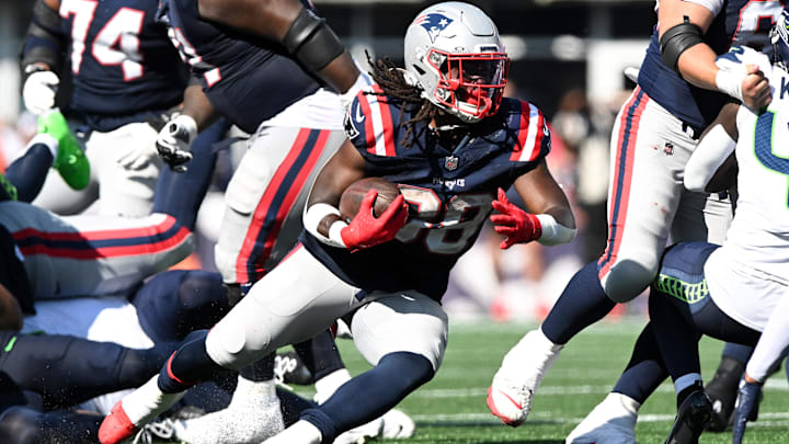 Sep 15, 2024; Foxborough, Massachusetts, USA;  New England Patriots running back Rhamondre Stevenson (38) runs with the ball against the Seattle Seahawks during the second half at Gillette Stadium.
