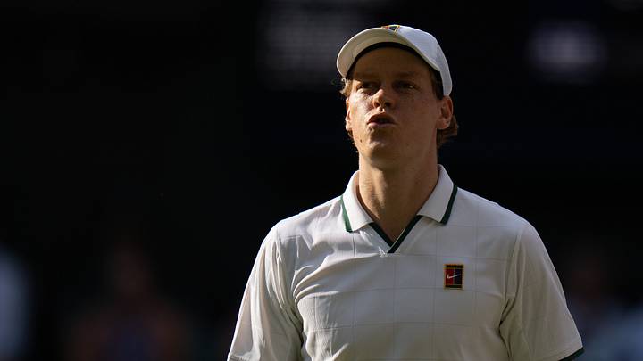 Jannik Sinner reacts during his semifinal match against Novak Djokovic at All England Lawn Tennis and Croquet Club. Mandatory Credit: Susan Mullane-Imagn Images Jannik Sinner reacts during his semifinal match against Novak Djokovic at All England Lawn Tennis and Croquet Club. Mandatory Credit: Susan Mullane-Imagn Images