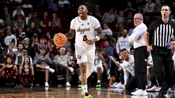 Texas A&M Aggies guard Wade Taylor IV (4) dribbles the ball during the first half against the Abilene Christian Wildcats at Reed Arena.