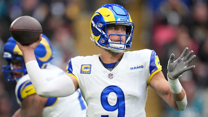 Oct 19, 2025; London, United Kingdom; Los Angeles Rams quarterback Matthew Stafford (9) passes the ball against the Jacksonville Jaguars during the first half of an NFL International Series game at Wembley Stadium. Mandatory Credit: Kirby Lee-Imagn Images