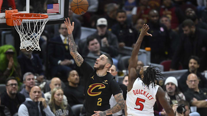 Oct 31, 2025; Cleveland, Ohio, USA; Cleveland Cavaliers guard Lonzo Ball (2) misses a layup beside Toronto Raptors guard Immanuel Quickley (5) in the fourth quarter at Rocket Arena. Mandatory Credit: David Richard-Imagn Images Oct 31, 2025; Cleveland, Ohio, USA; Cleveland Cavaliers guard Lonzo Ball (2) misses a layup beside Toronto Raptors guard Immanuel Quickley (5) in the fourth quarter at Rocket Arena. Mandatory Credit: David Richard-Imagn Images