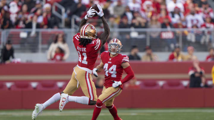 Dec 24, 2022; Santa Clara, California, USA; San Francisco 49ers wide receiver Brandon Aiyuk (11) catches the ball during the third quarter against the Washington Commanders at Levi's Stadium. Mandatory Credit: Stan Szeto-USA TODAY Sports Dec 24, 2022; Santa Clara, California, USA; San Francisco 49ers wide receiver Brandon Aiyuk (11) catches the ball during the third quarter against the Washington Commanders at Levi's Stadium. Mandatory Credit: Stan Szeto-USA TODAY Sports
