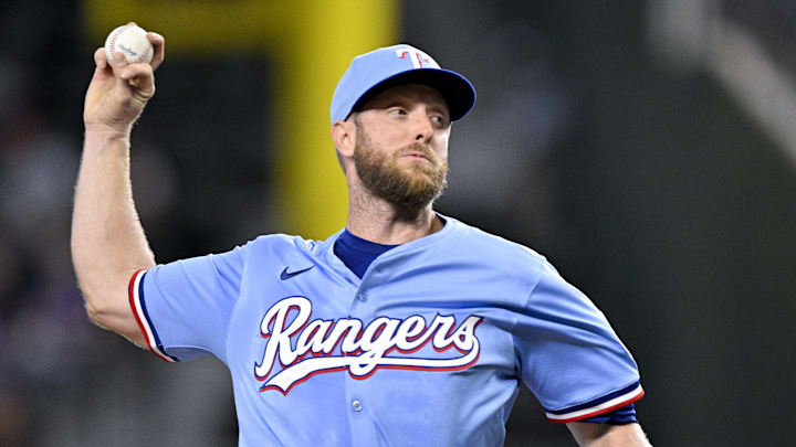 Sep 21, 2025; Arlington, Texas, USA; Texas Rangers starting pitcher Merrill Kelly (23) throws the ball during the first inning against the Miami Marlins at Globe Life Field. Mandatory Credit: Jerome Miron-Imagn Images
