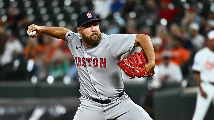 Aug 27, 2025; Baltimore, Maryland, USA;  Boston Red Sox pitcher Greg Weissert (57) delivers a pitch during the eighth inning against the Baltimore Orioles at Oriole Park at Camden Yards. Mandatory Credit: James A. Pittman-Imagn Images