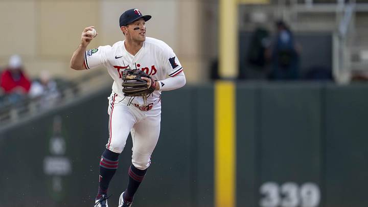 May 18, 2026; Minneapolis, Minnesota, USA; Minnesota Twins shortstop Brooks Lee (22) throws the ball to second base for an out against the Houston Astros in the first inning at Target Field. Mandatory Credit: Jesse Johnson-Imagn Images