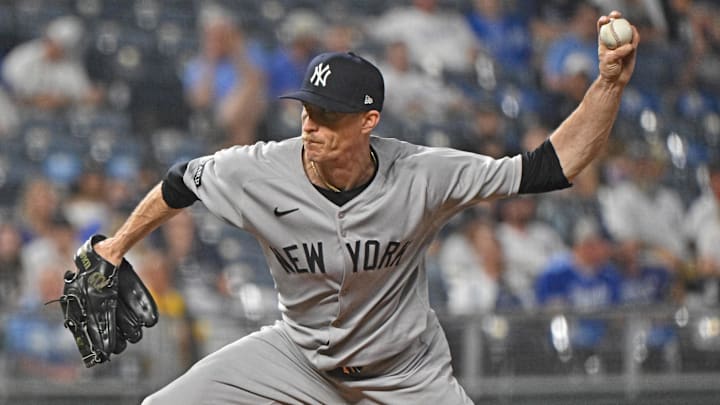 Jun 10, 2025; Kansas City, Missouri, USA;  New York Yankees relief pitcher Tim Hill (41) throws a pitch in the ninth inning against the Kansas City Royals at Kauffman Stadium. Mandatory Credit: Peter Aiken-Imagn Images