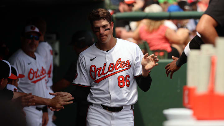 Mar 16, 2024; Sarasota, Florida, USA; Baltimore Orioles infielder Coby Mayo (86) scores a run during the fifth inning against the Boston Red Sox at Ed Smith Stadium. Mar 16, 2024; Sarasota, Florida, USA; Baltimore Orioles infielder Coby Mayo (86) scores a run during the fifth inning against the Boston Red Sox at Ed Smith Stadium.