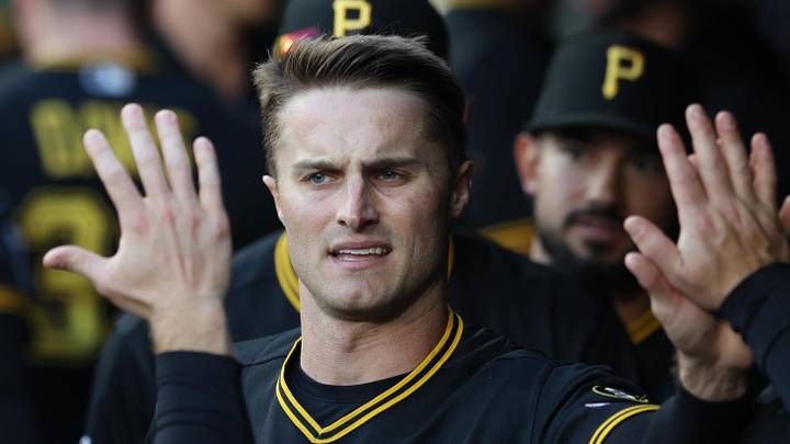 Apr 13, 2026; Pittsburgh, Pennsylvania, USA;  Pittsburgh Pirates left fielder Jake Mangum (28) high-fives in the dugout after scoring a run against the Washington Nationals during the second inning at PNC Park. Mandatory Credit: Charles LeClaire-Imagn Images