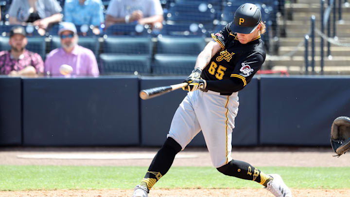 Apr 2, 2025; St. Petersburg, Florida, USA;  Pittsburgh Pirates outfielder Jack Suwinski (65) singles during the eighth inning against the Tampa Bay Rays at George M. Steinbrenner Field. Mandatory Credit: Kim Klement Neitzel-Imagn Images