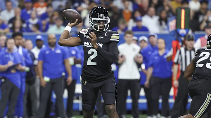 Dec 28, 2024; San Antonio, TX, USA; Colorado Buffaloes quarterback Shedeur Sanders (2) attempts a pass during the first quarter against the Brigham Young Cougars at Alamodome. Mandatory Credit: Troy Taormina-Imagn Images