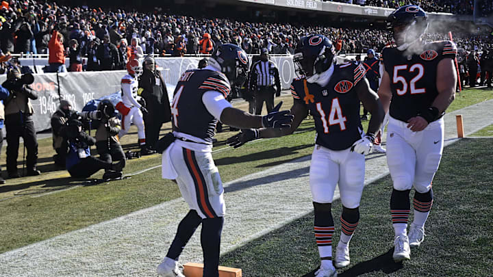 D'Andre Swift celebrates with Bears wide receiver Olamide Zaccheaus (14) and center Drew Dalman (52) after a TD Sunday. D'Andre Swift celebrates with Bears wide receiver Olamide Zaccheaus (14) and center Drew Dalman (52) after a TD Sunday.