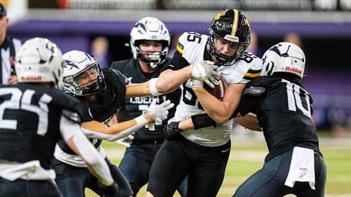 Southeast Polk's Teague Cantrall (85) pushes forward for a first down against Iowa City Liberty on Friday, Nov. 15, 2024, at the UNI-Dome in Cedar Falls, IA.