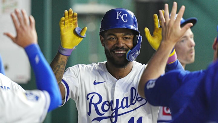 Aug 18, 2025; Kansas City, Missouri, USA; Kansas City Royals third baseman Maikel Garcia (11) is congratulated by teammates after hitting a home run during the fifth inning against the Texas Rangers at Kauffman Stadium. Mandatory Credit: Jay Biggerstaff-Imagn Images