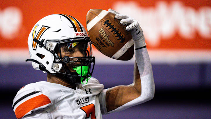 WDM Valley's Jayden McGregory celebrates after scoring a touchdown during a state semifinal game at the UNI-Dome on Friday, November 10, 2023 in Cedar Falls. WDM Valley's Jayden McGregory celebrates after scoring a touchdown during a state semifinal game at the UNI-Dome on Friday, November 10, 2023 in Cedar Falls.