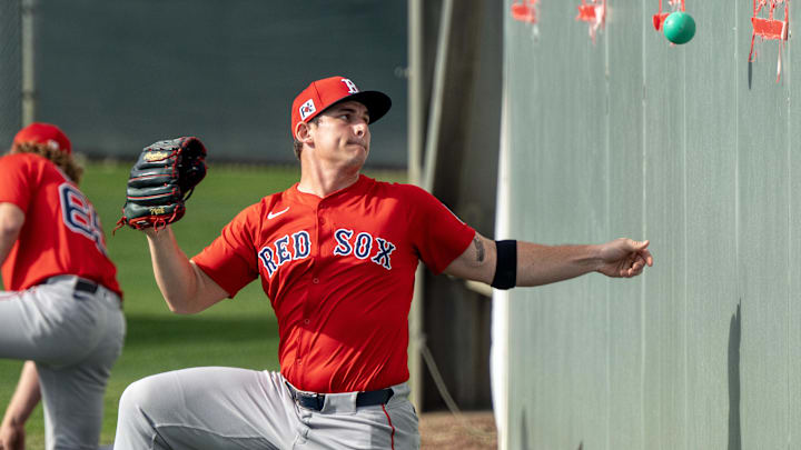 Boston Red Sox pitcher Zach Penrod (67) throws a ball against a wall during the first day of Spring Training on Feb 12, 2025 in Lee County, FL, USA. Chris Tilley-Imagn Images