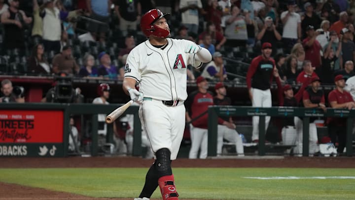 Jun 9, 2025; Phoenix, Arizona, USA; Arizona Diamondbacks first base Josh Naylor (22) hits a walk off grand slam home run against the Seattle Mariners in the eleventh inning at Chase Field. Mandatory Credit: Rick Scuteri-Imagn Images Jun 9, 2025; Phoenix, Arizona, USA; Arizona Diamondbacks first base Josh Naylor (22) hits a walk off grand slam home run against the Seattle Mariners in the eleventh inning at Chase Field. Mandatory Credit: Rick Scuteri-Imagn Images