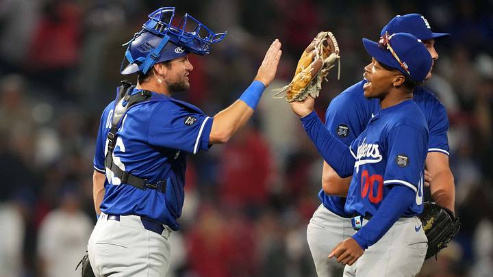 Mar 25, 2025; Anaheim, California, USA; Los Angeles Dodgers catcher Chris Okey (46) and outfielder Kendall George (00) celebrate at the end of the game against the Los Angeles Angels at Angel Stadium. Mandatory Credit: Kirby Lee-Imagn Images Mar 25, 2025; Anaheim, California, USA; Los Angeles Dodgers catcher Chris Okey (46) and outfielder Kendall George (00) celebrate at the end of the game against the Los Angeles Angels at Angel Stadium. Mandatory Credit: Kirby Lee-Imagn Images