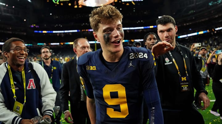 Jan 8, 2024; Houston, TX, USA; Michigan Wolverines quarterback J.J. McCarthy (9) celebrates after winning the national championship