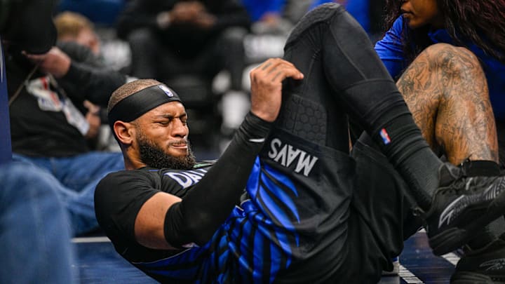 Jan 14, 2026; Dallas, Texas, USA; Dallas Mavericks forward Daniel Gafford (21) suffers an apparent injury during the second half against the Denver Nuggets at the American Airlines Center. Mandatory Credit: Jerome Miron-Imagn Images Jan 14, 2026; Dallas, Texas, USA; Dallas Mavericks forward Daniel Gafford (21) suffers an apparent injury during the second half against the Denver Nuggets at the American Airlines Center. Mandatory Credit: Jerome Miron-Imagn Images