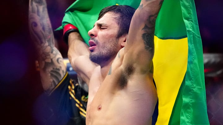 Dec 16, 2023; Las Vegas, Nevada, USA; Alexandre Pantoja (red gloves) reacts after defeating Brandon Moreno. Dec 16, 2023; Las Vegas, Nevada, USA; Alexandre Pantoja (red gloves) reacts after defeating Brandon Moreno.