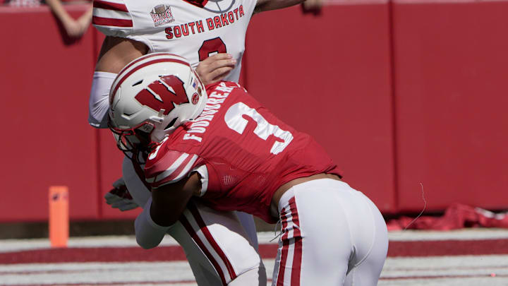 Wisconsin cornerback Nyzier Fourqurean (3) pressures South Dakota quarterback Aidan Bouman (2) during the first quarter of their game Saturday, September 7 , 2024 at Camp Randall Stadium in Madison, Wisconsin.