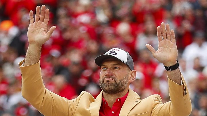 Oct 14, 2023; Madison, Wisconsin, USA; NFL Hall of Fame member and former Wisconsin Badgers offensive tackle Joe Thomas waves to the crowd as he s honored during a game between Wisconsin Badgers and Iowa Hawkeyes at Camp Randall Stadium. 