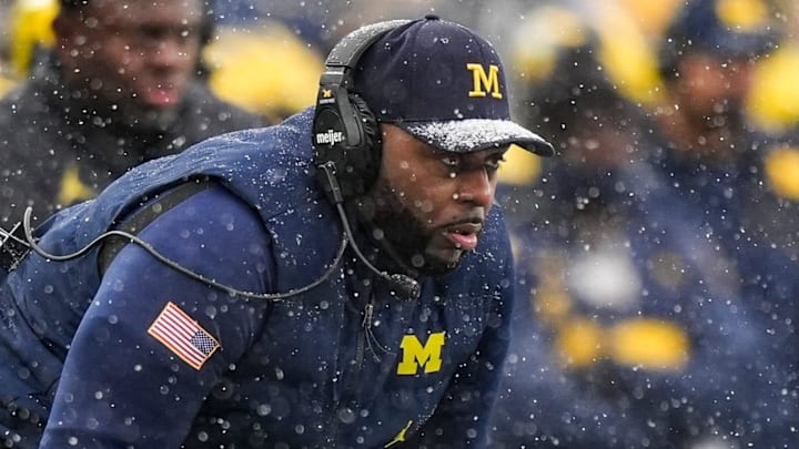 Michigan head coach Sherrone Moore watches a play against Ohio State during the second half at Michigan Stadium in Ann Arbor on Saturday, Nov. 29, 2025. Michigan head coach Sherrone Moore watches a play against Ohio State during the second half at Michigan Stadium in Ann Arbor on Saturday, Nov. 29, 2025.