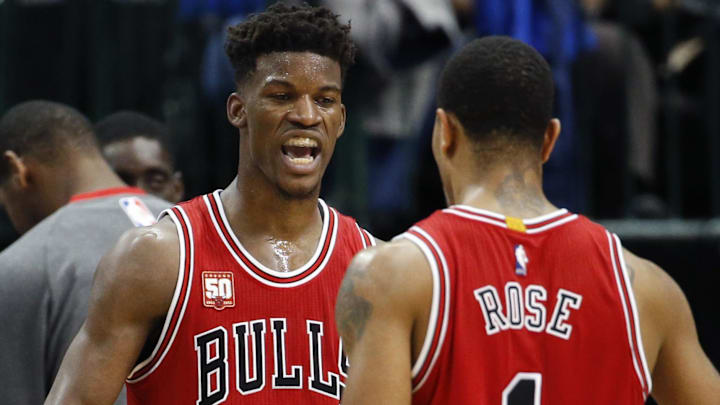 Dec 26, 2015; Dallas, TX, USA; Chicago Bulls guard Derrick Rose (1) and guard Jimmy Butler (21) celebrate during the second half against the Dallas Mavericks at American Airlines Center. Mandatory Credit: Kevin Jairaj-Imagn Images